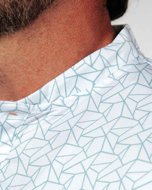Teal Geometric Blade Polo